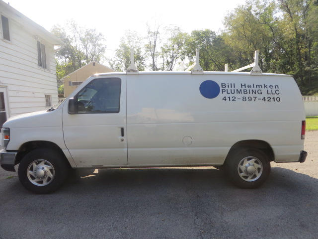 work van Bill Helmken Plumbing LLC work van with phone number 412-897-4210
