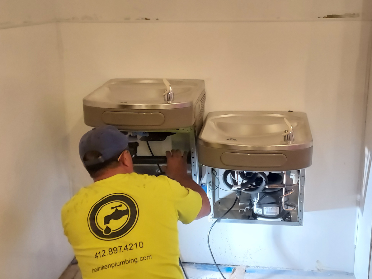 Bill Helmken Installing Bi Level Drinking Fountain T Mobile Downtown Pittsburgh